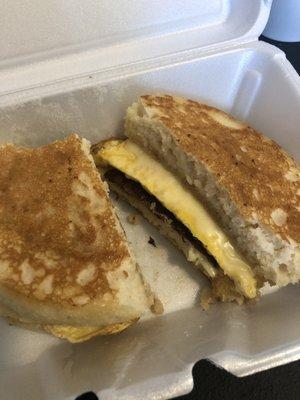 Breakfast sandwich on pancake bread to go.