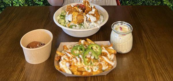 Spicy Mayo fries (SO GOOD), rice pudding, spicy Chicken Tikka Salad Bowl