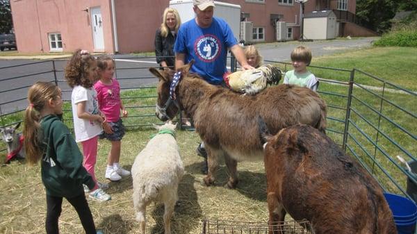 The petting zoo came for a visit.