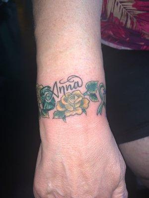 In honor of my daughter with her birth stone emerald and yellow rose of Texas