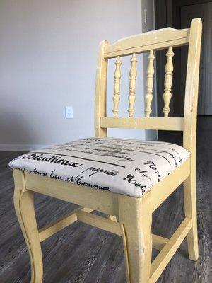 Cute chair with reupholstered cushion.