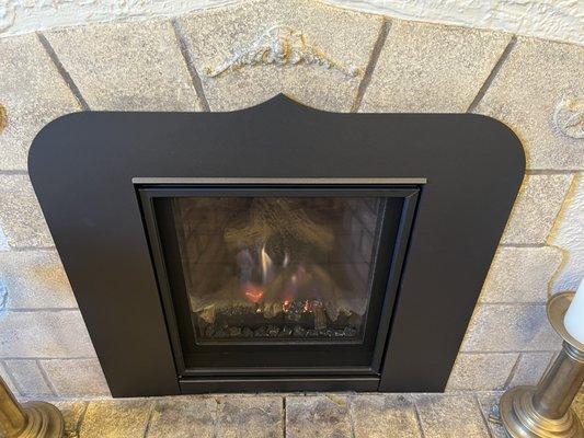 Fireplace with custom surround.