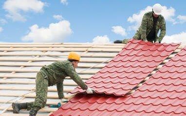 Roofing panels loaded onto a roof over raised batten's.