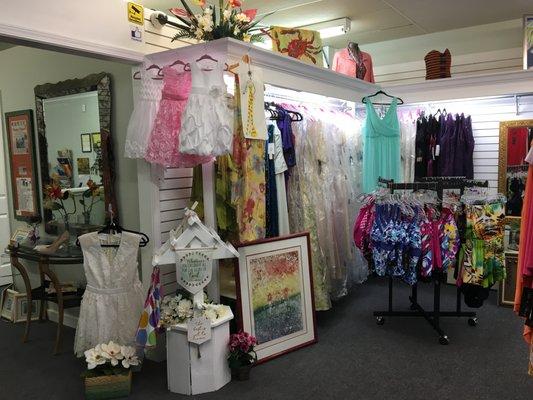 Bridal gowns, mother of the bride and flower girl dresses are the new addition to Tropical Apparel Fashion Gallery in September of 2018.