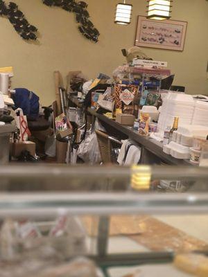 Hoarders store their junk at sushi bar counter tops