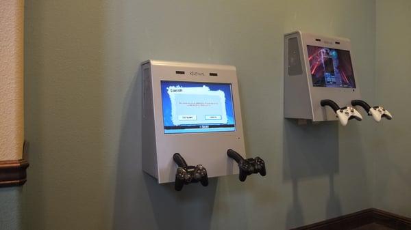 Xbox and Playstation in the waiting area.