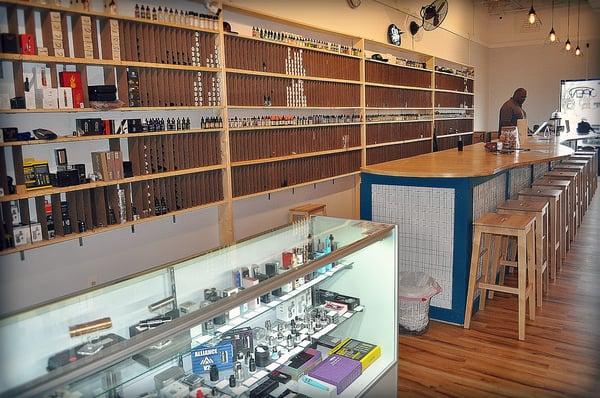 Virginia's largest juice wall.... 32 feet of vaping choice.