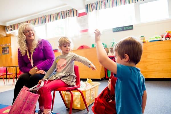 Through active participation in the classroom - here in Show and Tell - children gain confidence and self-esteem.