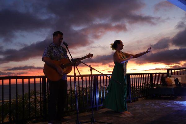 Beautiful sunset view with hula dancer