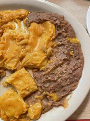 Cheese enchilada, rice and beans.