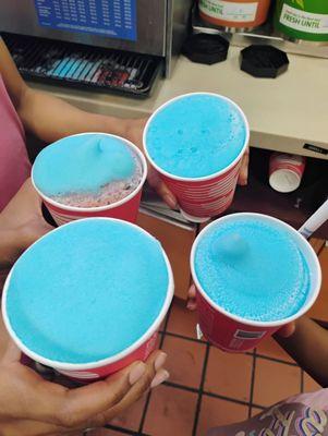 3 small blue raspberry slushies, and 1 small blue raspberry and wild cherry fusion