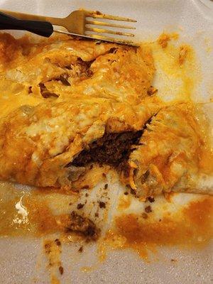 11. Beef Burrito (right), Taco (not pictured) and Enchilada (left). View of protein inside.