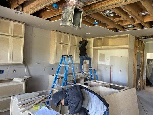 Kitchen remodel in process, moving walls and building cabinets