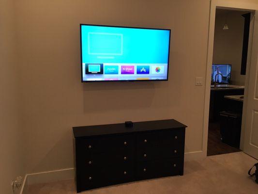 Wall mounted TV with concealed cables