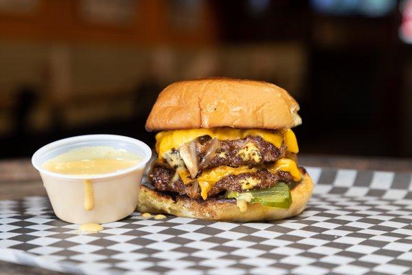 The Foxtrot - Two American Wagyu patties, Two slices of American Cheese, caramelized onions, pickles and Foxtrot sauce.