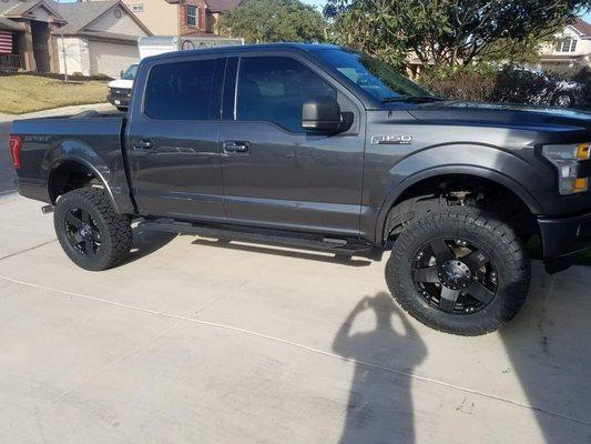 6 inch lift, 20 inch rockstar rims, 35 inch nitty grappler tires