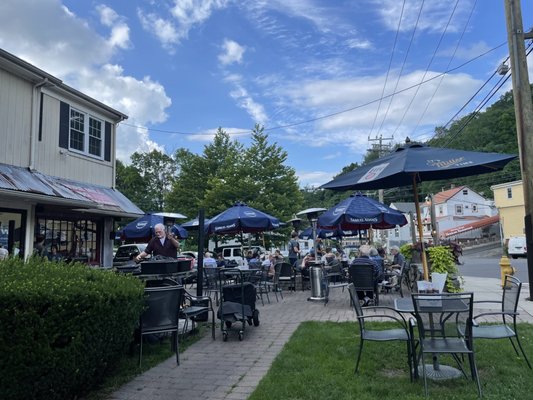 View of the outdoor seating area, taken from the picnic tables