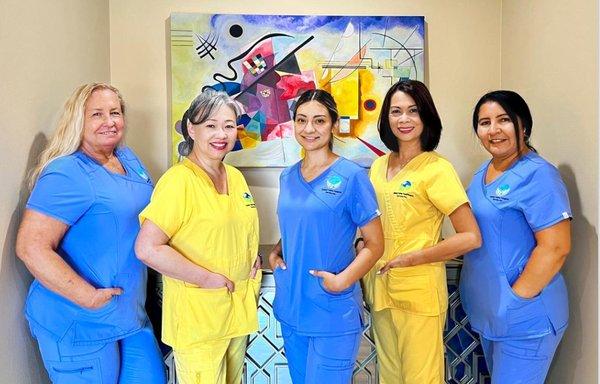 Our wonderful team of disciplines from CHHA's, Director of Nursing, and LVN wearing our Blue and Yellow Uniforms.