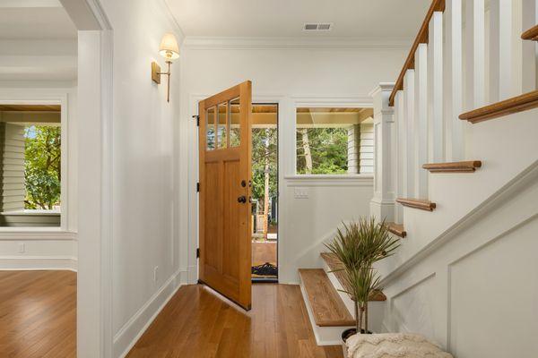 Hardwood floor installation, new drywall and paint throughout.