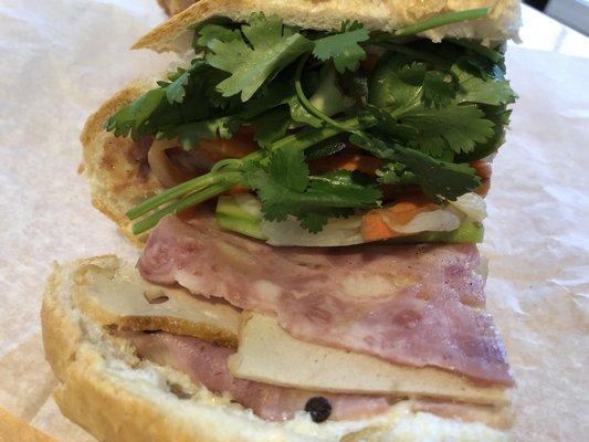 Bánh Mì Thįt Nguôi- Pate, Cold Cut Sliced Pork and Ham. Served w/ Mixed Vegetable in a toasted French Bread. $4.50