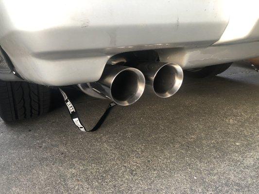 Exhaust tips coming out the back