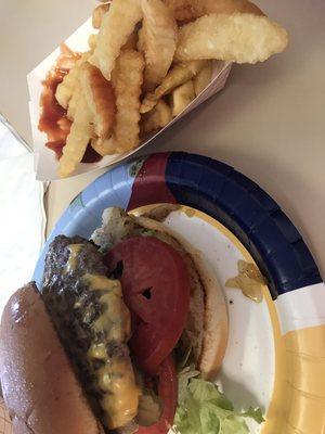 Cheeseburger with all the fixings and grilled onions  Fresh fries