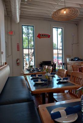 Big historic windows of this property make for a sunny exposure