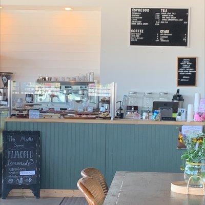 Front counter with the menu backdrop.