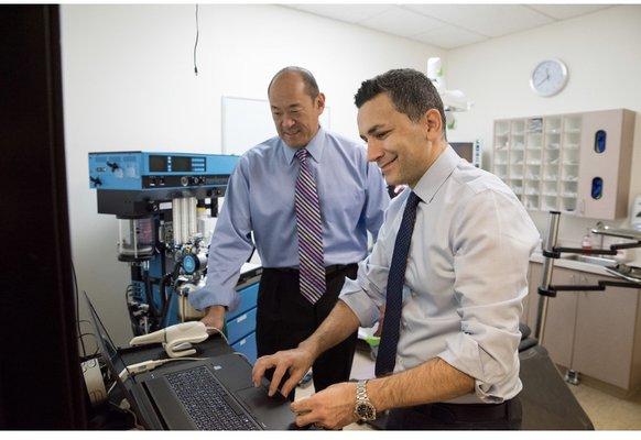 Dr Matin and Dr Chang working together.
 We use state of art technology:  intraoral scanner, dental implant navigation, anesthesia machine