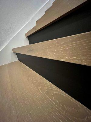 Square stairs made of the same hardwood planks!