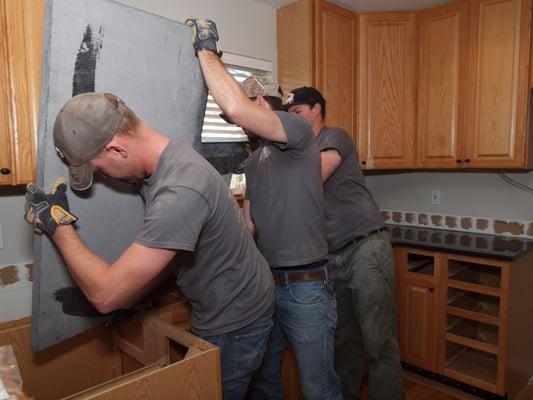 Heritage Tile Marble & Granite installing a granite countertop in Boulder, CO