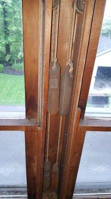 Cool pic of the inside workings of an old single pane window !