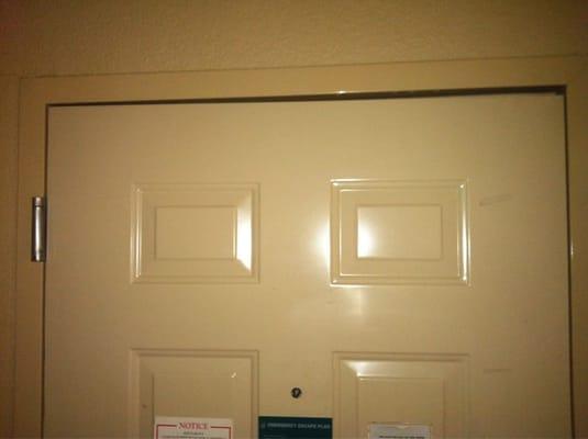 Lol the door must have been kicked down or pried open you have to turn the knob and lift to open