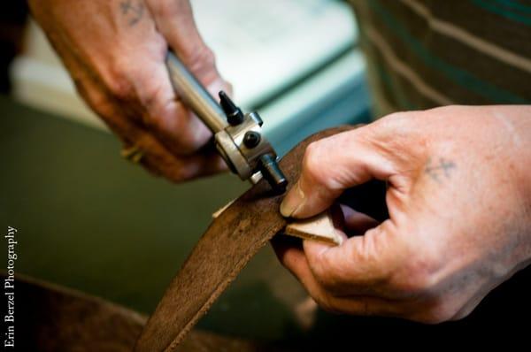 fixing a vintage belt at Nob Hill Shoe Repair ~ Photo courtesy of Erin Berzel: www.erinberzel.com