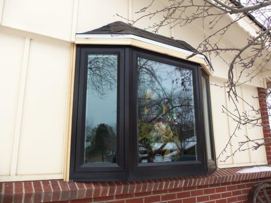 ....and bay windows are beautiful outside too!  we make custom sizes, many colors, and materials to match in and out!