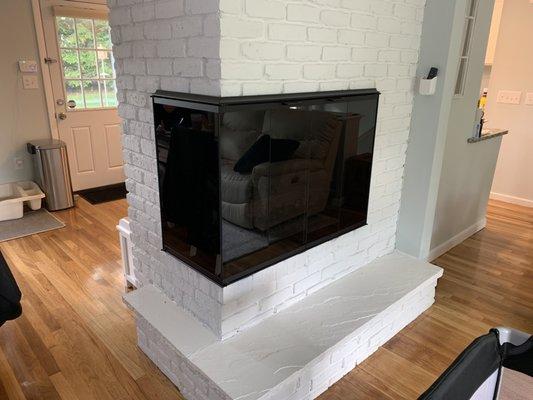 Gas logs and custom fireplace doors by Natick Fireplace