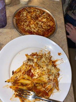 Lunch baked ziti w meat sauce and lunch pepperoni and roasted garlic pizza. Cheese bread was included with the ziti but it was devoured