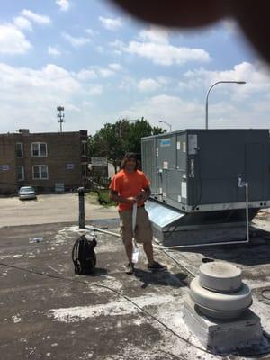 Zachary vaci finishing rooftop installation