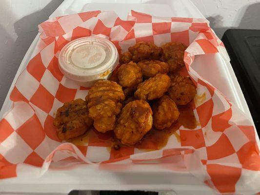 Mango habanero boneless chicken wings with cup of ranch