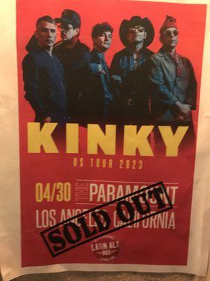 Concert poster at venue.