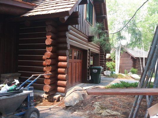 Log home restoration and staining