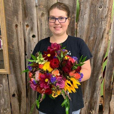 Cheryce proudly shows off one of our bouquets.