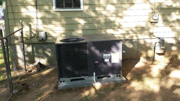 Packaged heating and cooling unit. Replaced an existing furnace/AC where tight crawlspace access prevented routine maintenance of system.