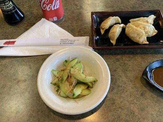 Crab and cucumber Sadler as a side to my meal. Fried pork dumplings as an appetizer.