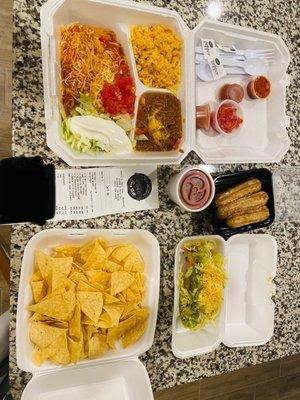 2 enchilada plate , 3 rolled tacos , chips & salsa and churros $28