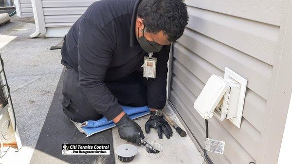 Termite Bait Station installation cored in concrete.