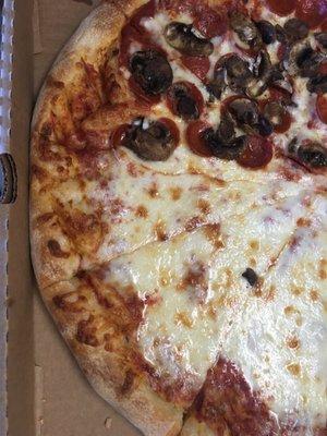 Half pepperoni and mushrooms