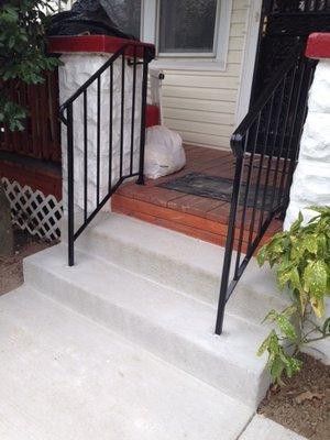 Concrete steps with iron rails