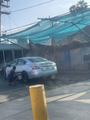 Washing wheels and car