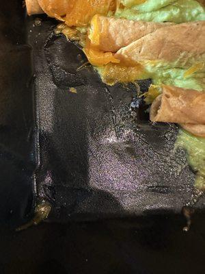 Melted styrofoam in 3 Rolled Tacos Cheese & Guacamole